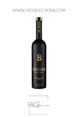 A bottle of Belvedere Thirty Brew Fish Sauce against a white background, featuring a black label with gold lettering and a gold neck seal.