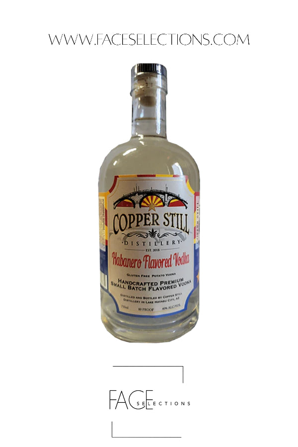 A bottle of Face Selections Copper Still Distillations Habanero Flavored Fish Sauce on a white background, featuring a clear glass bottle with a black cap and a colorful label.